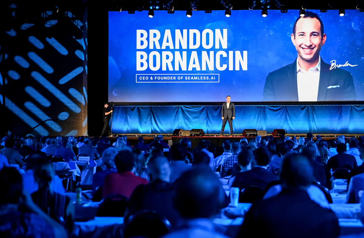 Brandon speaking at event