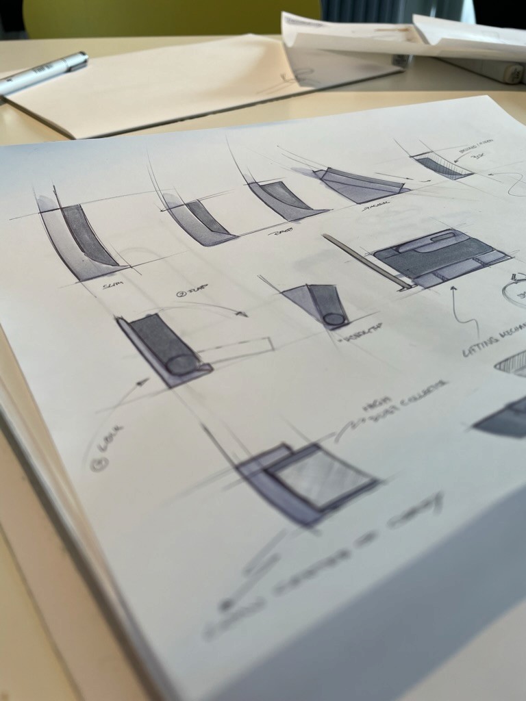 Streetside billboard with flyposters of the Batch.Works brand and illustrations