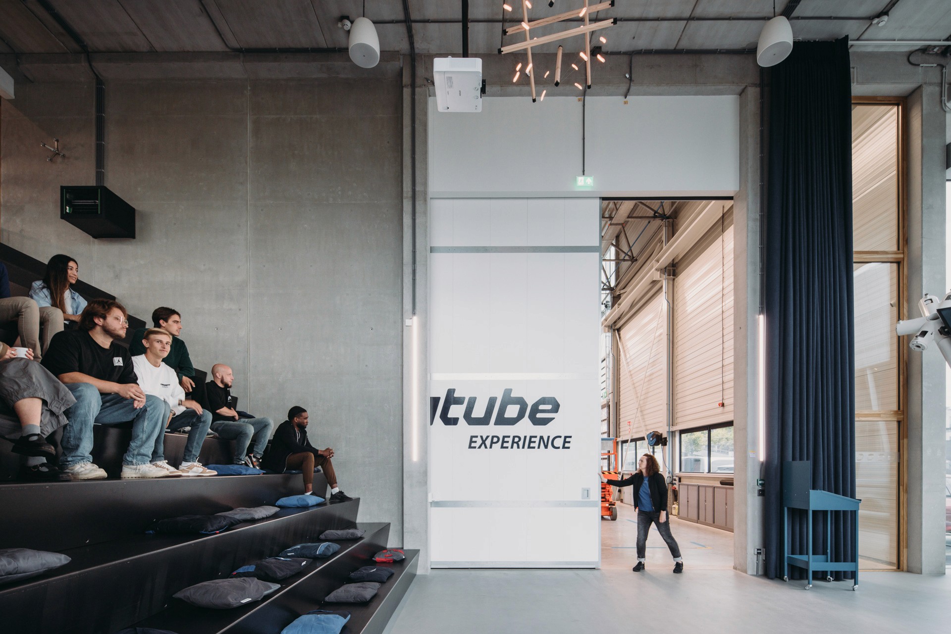 Interior photo of the large presentation space, connecting to the production facilities in the adjacent space