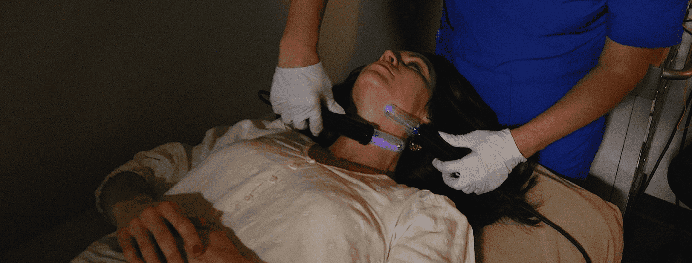 Client receiving alternative medicine therapy at Waco Healing Room