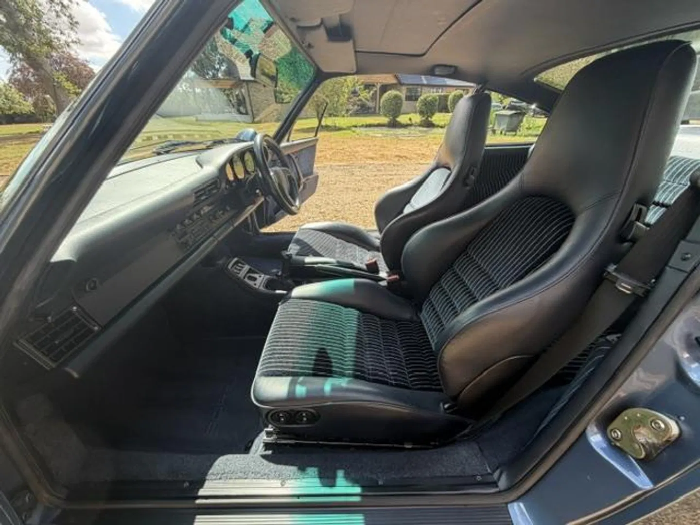Driver and passenger sport seats viewed from the doorway