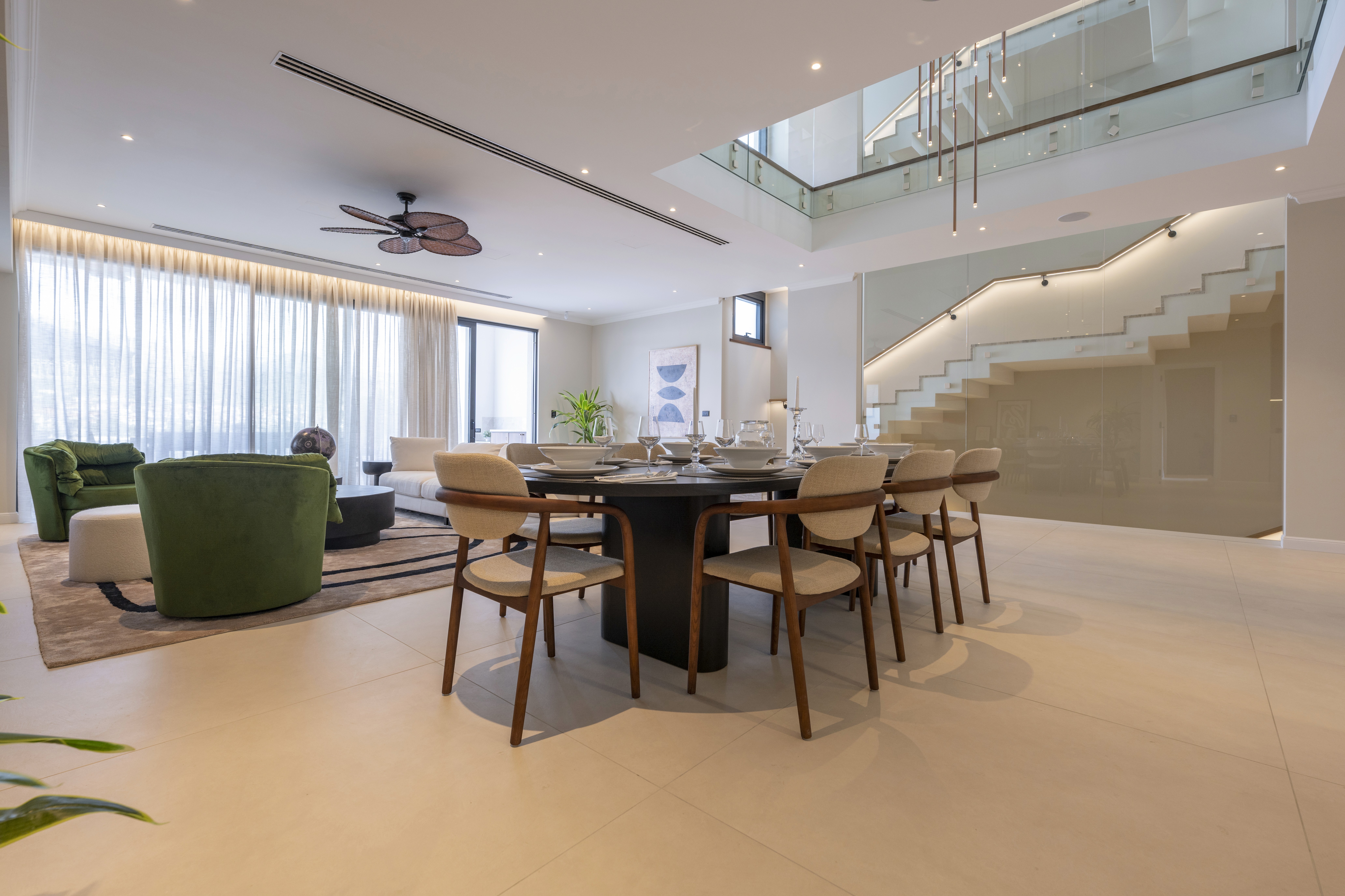 Ornate classic bathroom with claw-foot tub and wood paneling.