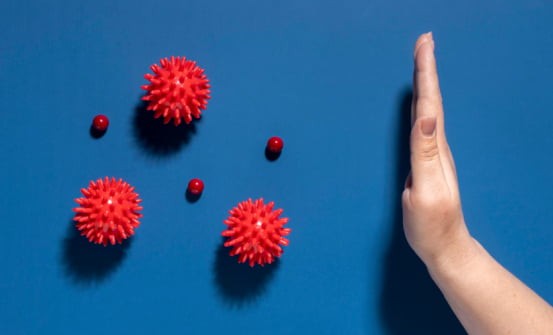 Рука зупиняє клітини вірусу