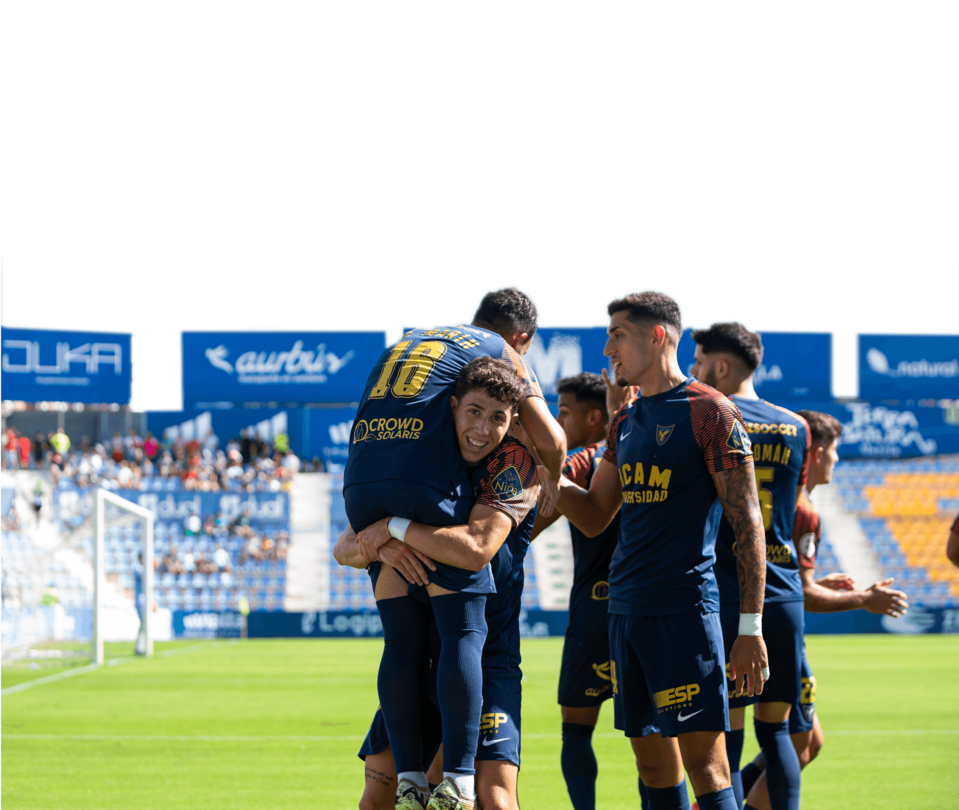 Jugadores del UCAM International Football Team celebrando un gol durante un partido en el estadio de La Condomina | UCAM Universidad Católica de Murcia