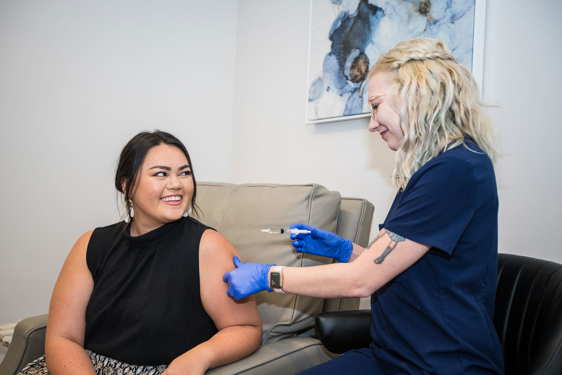 woman in white crew neck shirt smiling