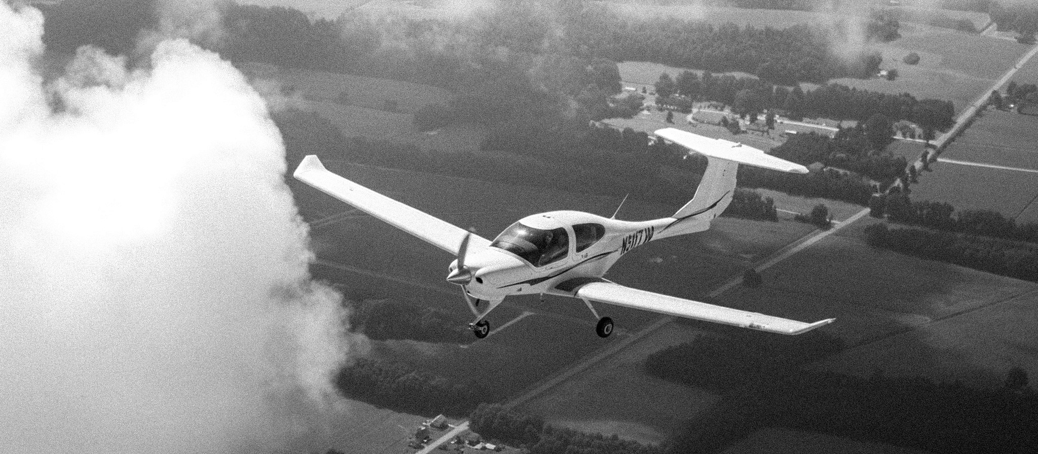 white ceramic mug on brown wooden table