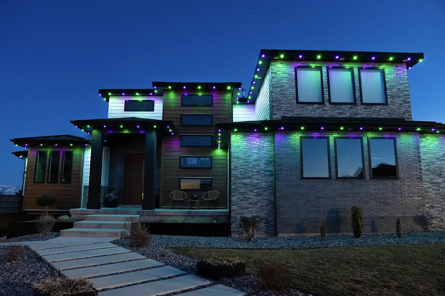 House with orange purple Halloween permanent LED lighting