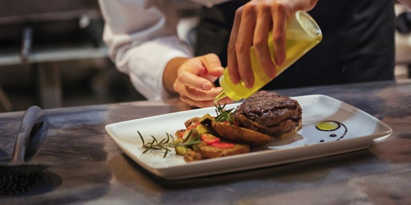 Seasonal dish being prepared in a restaurant kitchen