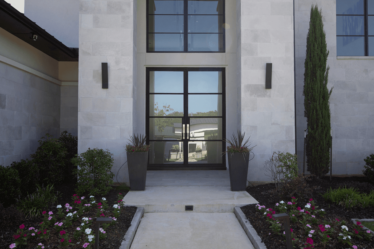 Traditional wrought iron double doors by M2 Metals Iron Doors DFW