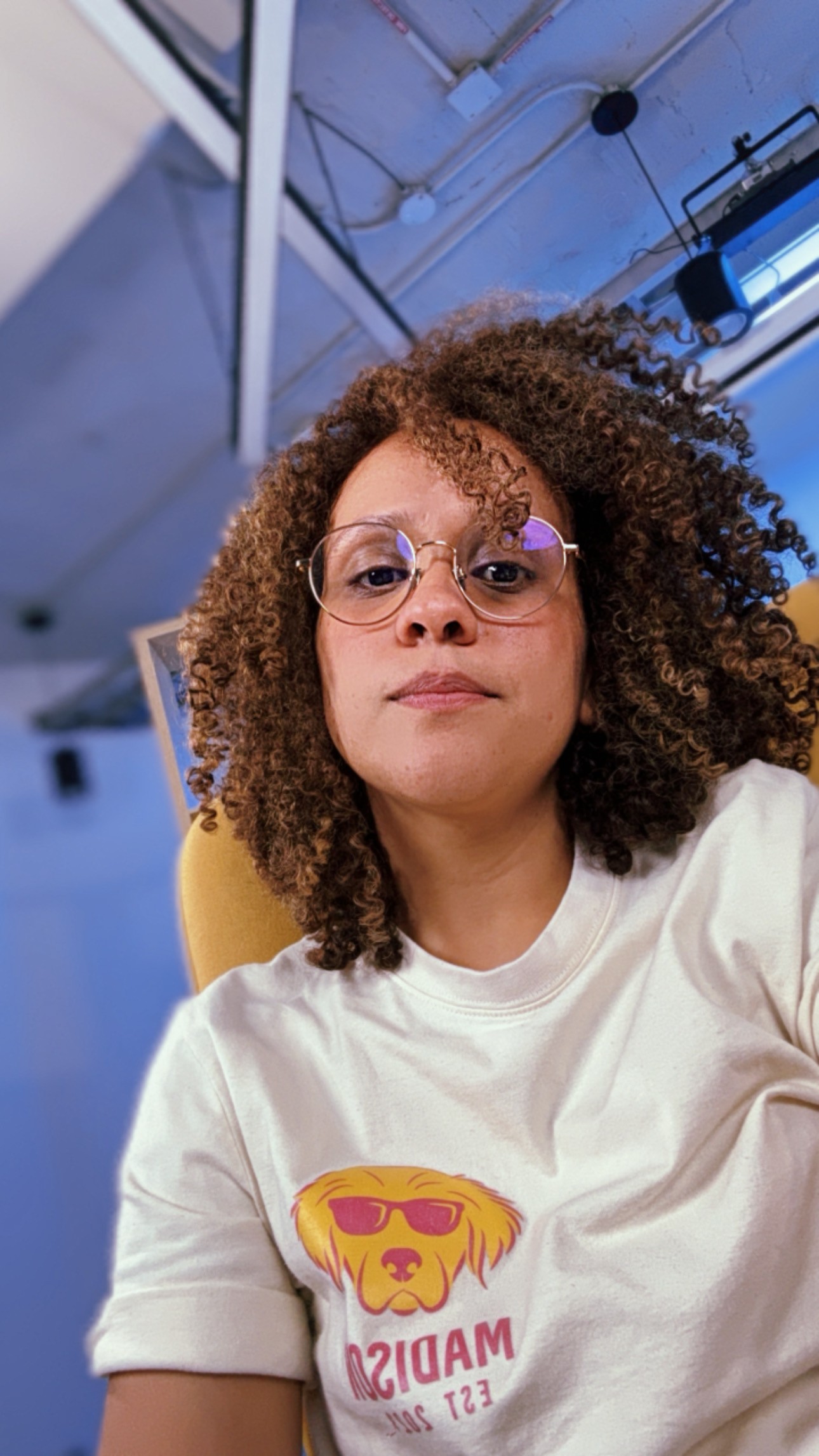 a blurry photo of a person standing in front of a wall