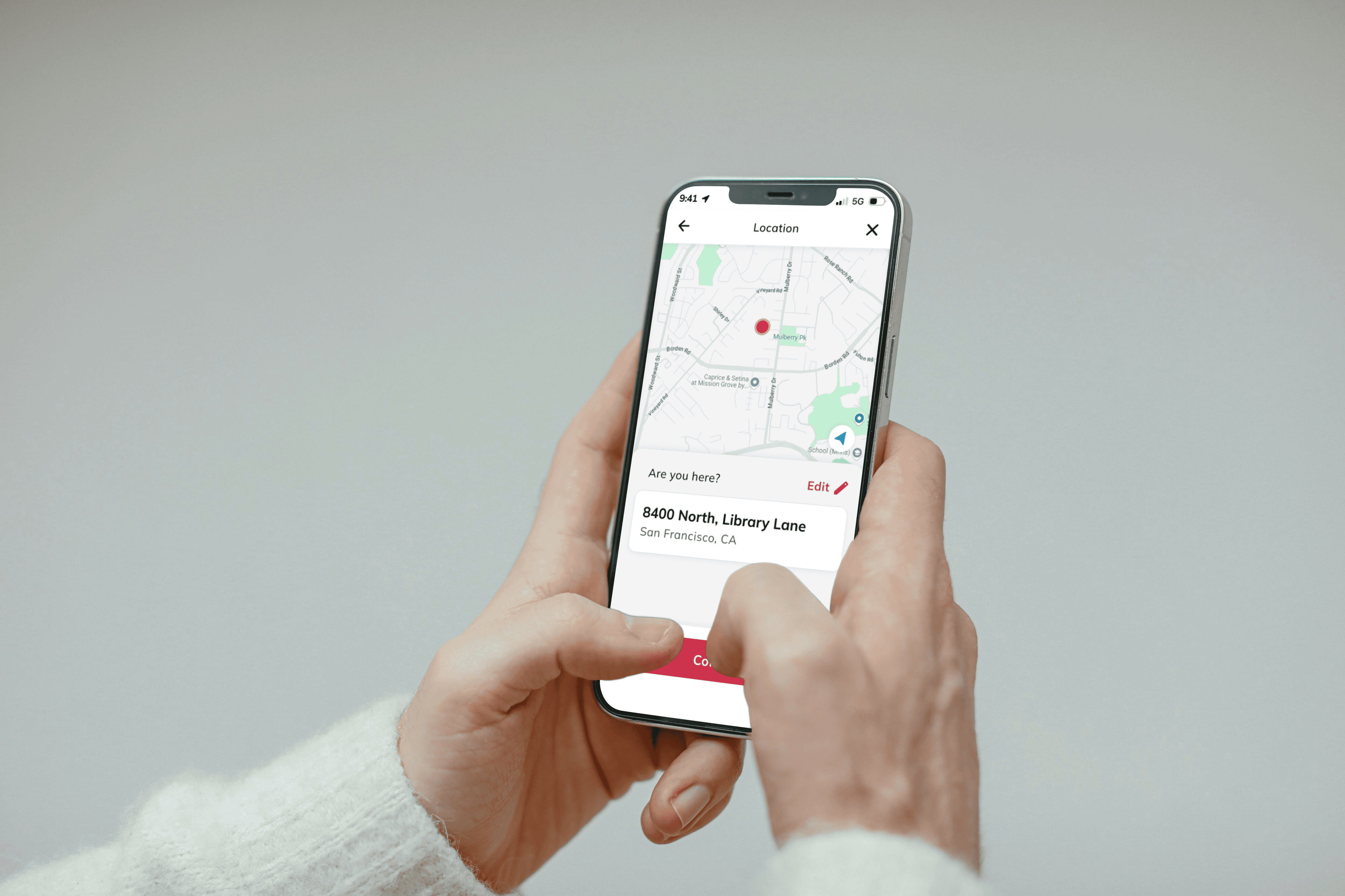 Mockup of a mobile app in a person's hand