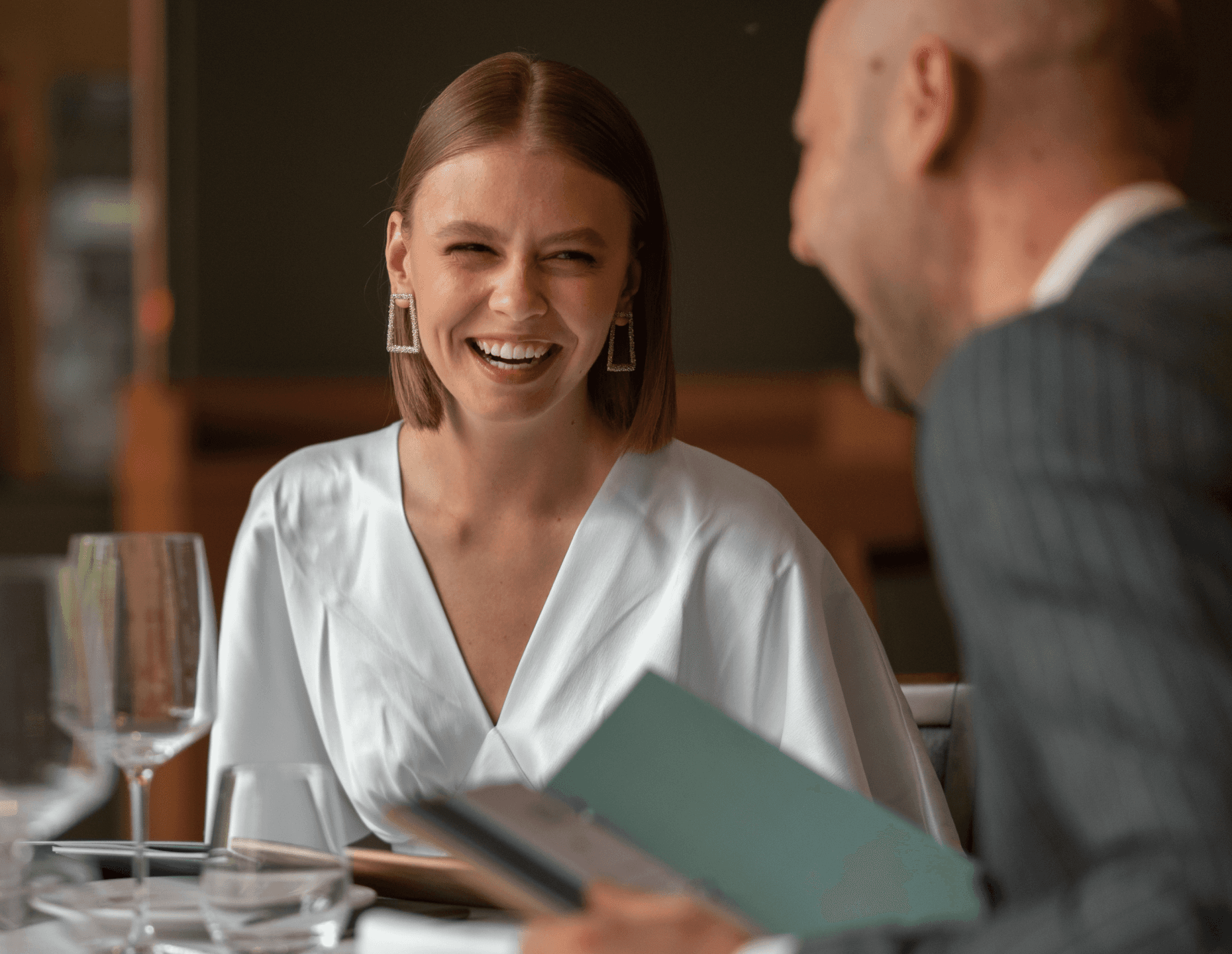 two people are laughing