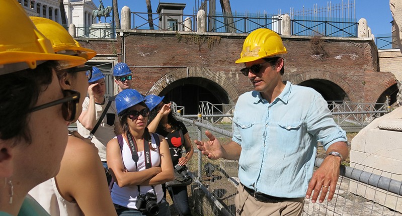 instructor with a yellow helmet