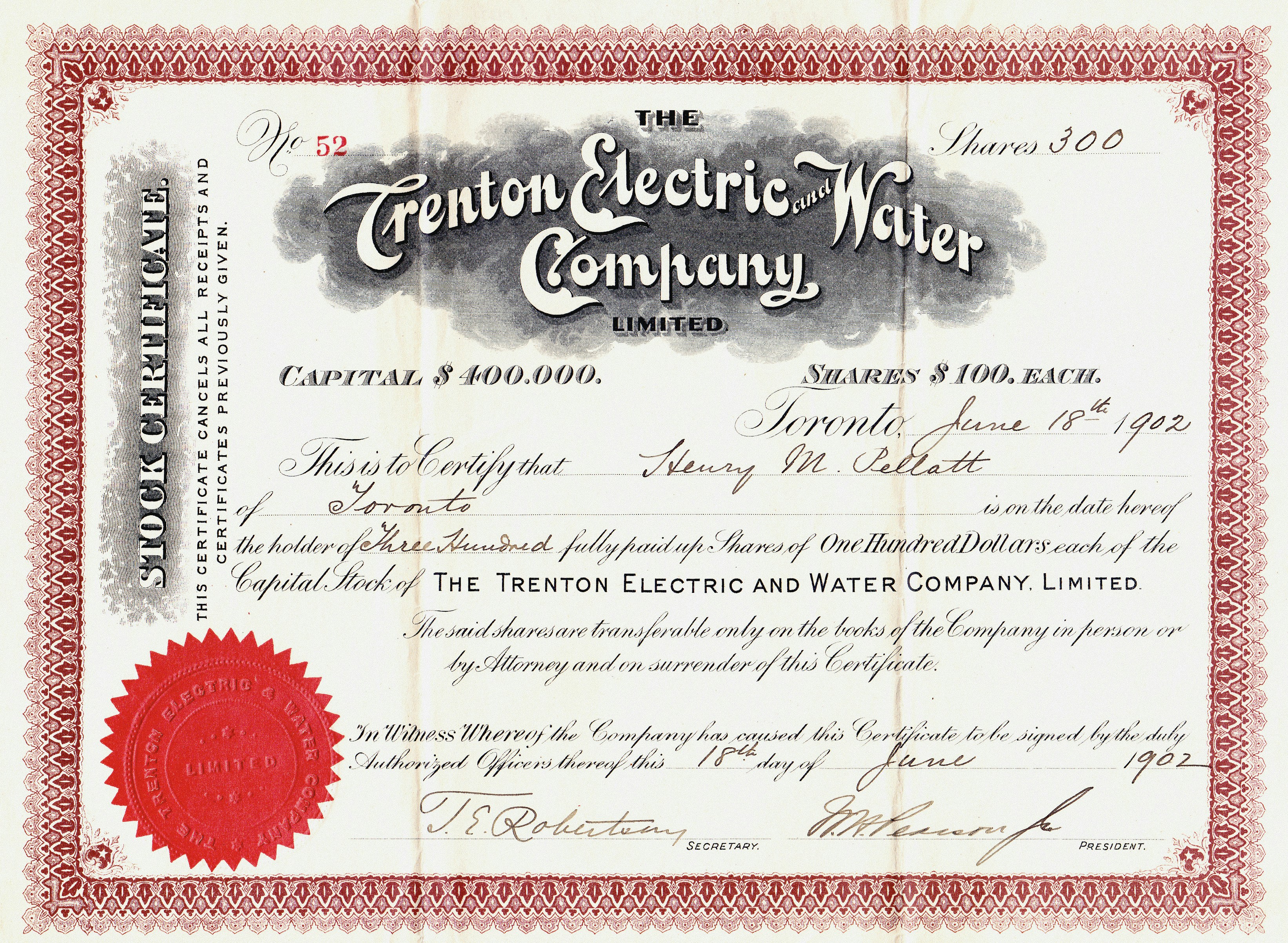2024-039 Certificate for 300 shares in the Trenton Electric and Water Company Limited, in the name of Henry M. Pellatt. Originally found with discarded materials at Casa Loma in Toronto. Donated by Brian Duke in May 2024. Taken on June 18, 1902