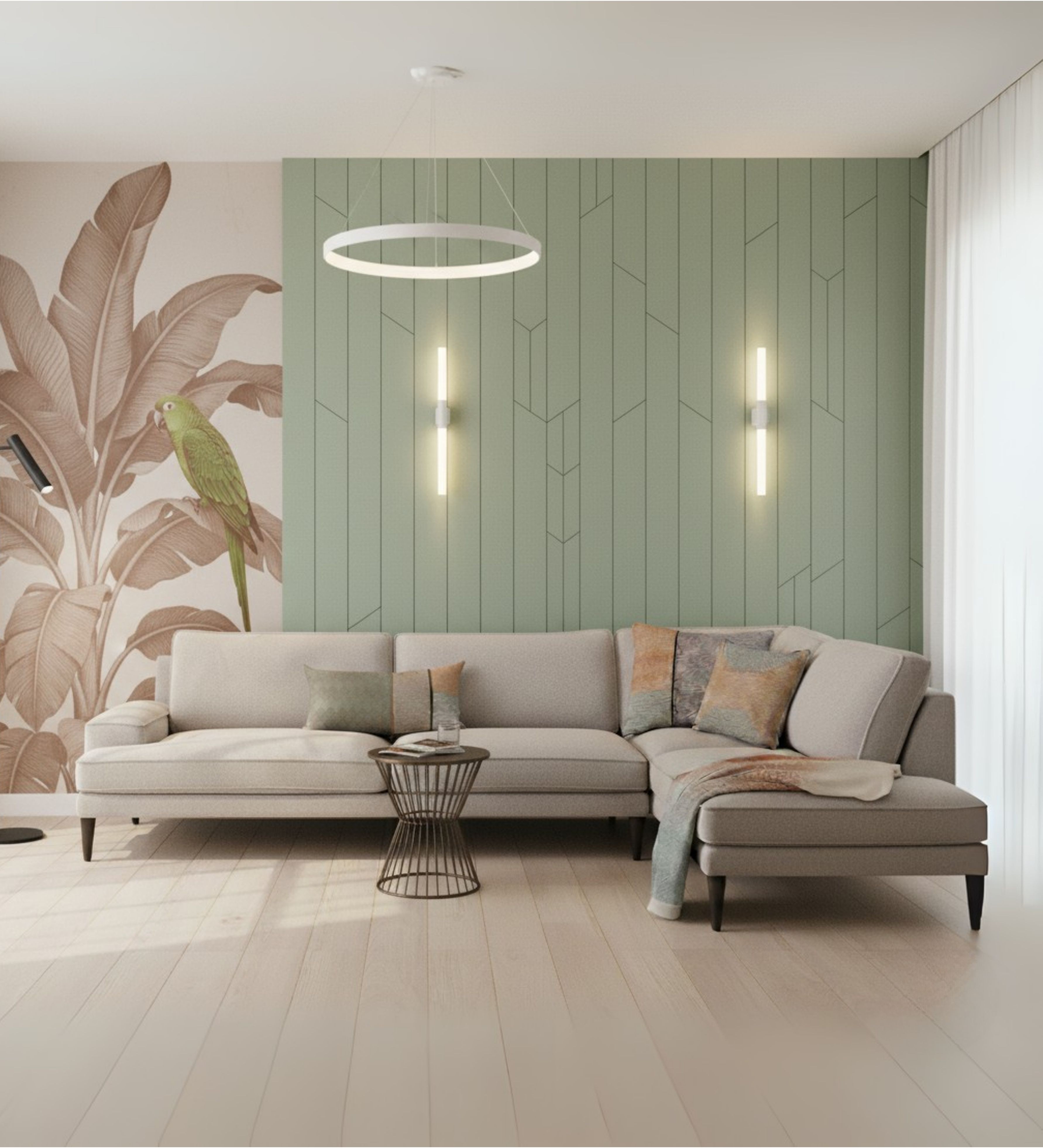 Light‑toned sectional sofa styled against a soft green feature wall