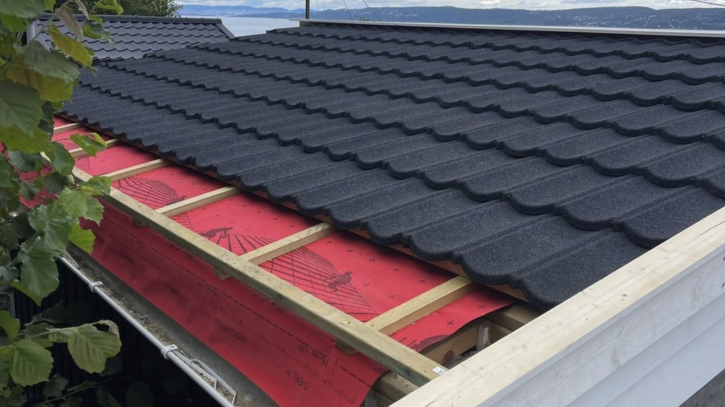 Takomlegg med beslagarbeid, profesjonelt håndverk