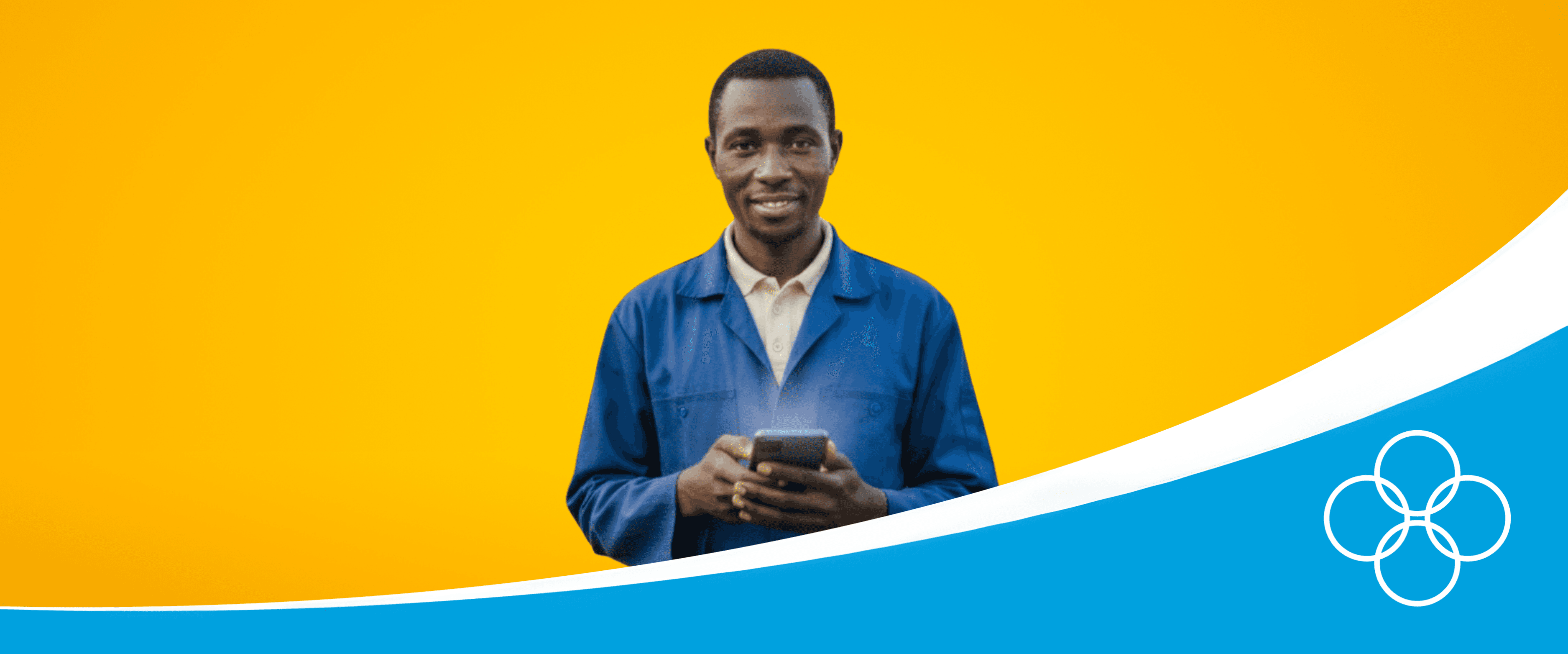 Poultry farmer in a blue overall with a phone in his hand with 123POULTRY app on his screen
