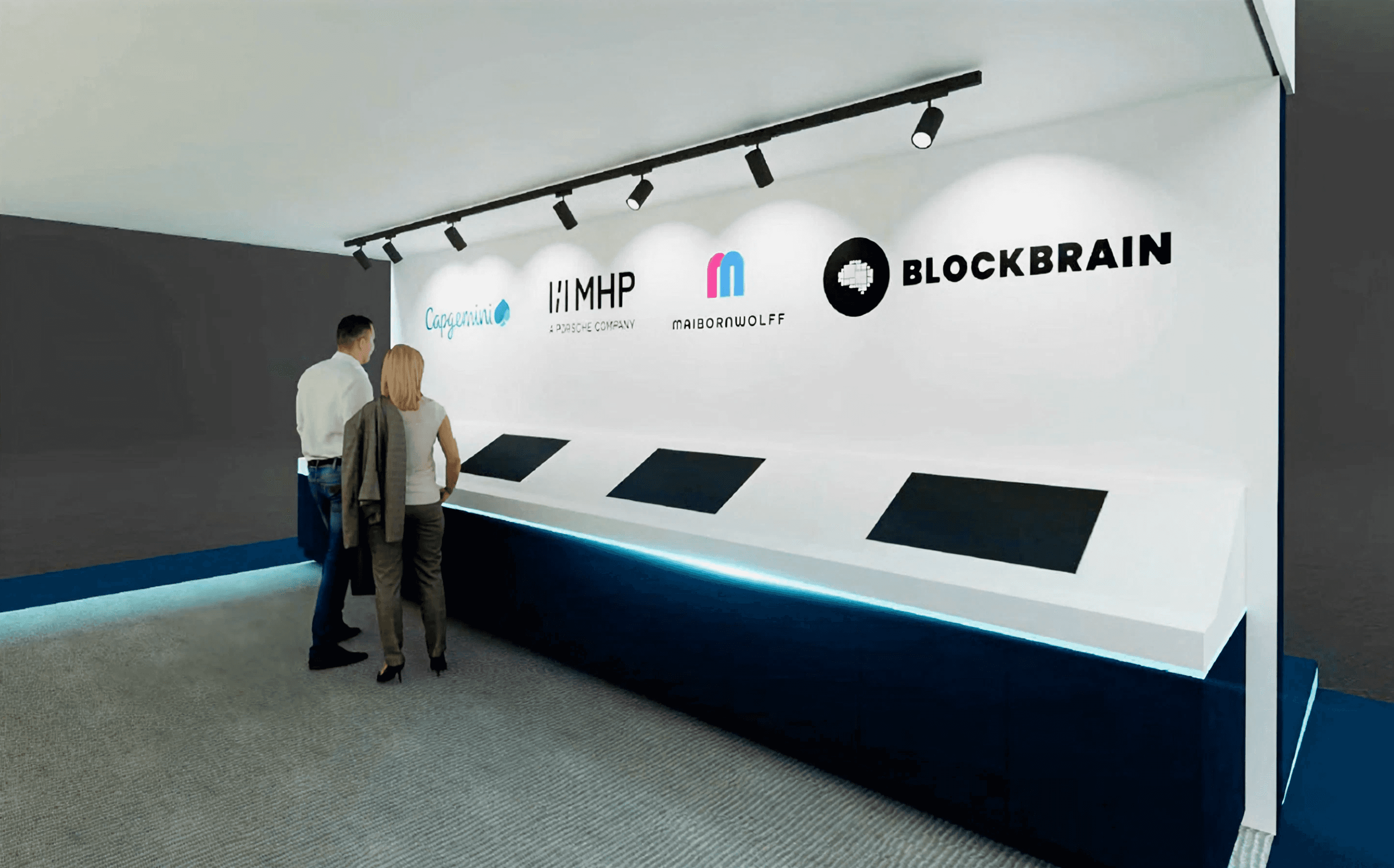Two people attending the Blockbrain exhibition