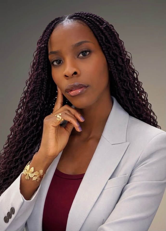 man standing in front of window