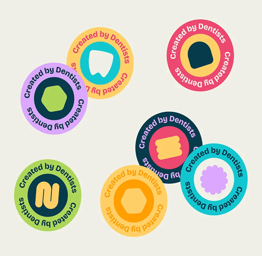 Colorful BABSY circular character badges with playful icons and Created by Dentists messaging