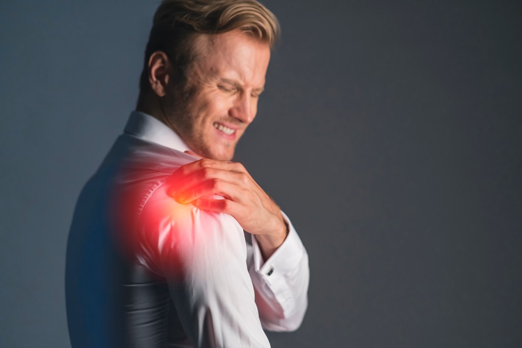 man with shoulder pain