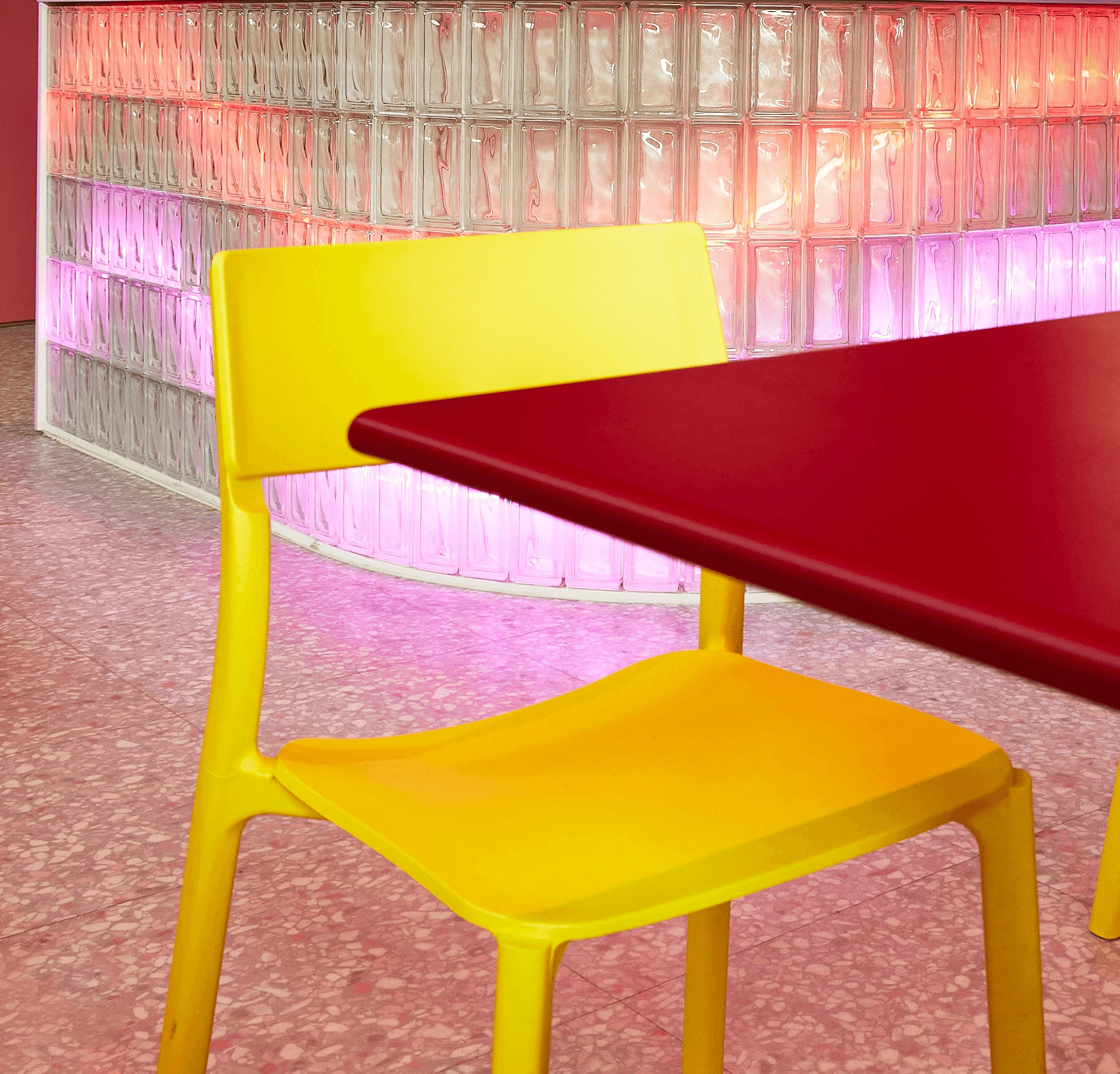 a restaurant with a bar and chairs