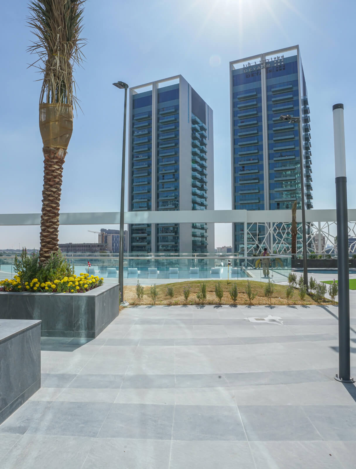 Modern urban views from the Bella Rose leisure deck. Professional real estate services for investors and buyers.