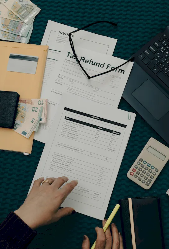 A person looking at tax return documents