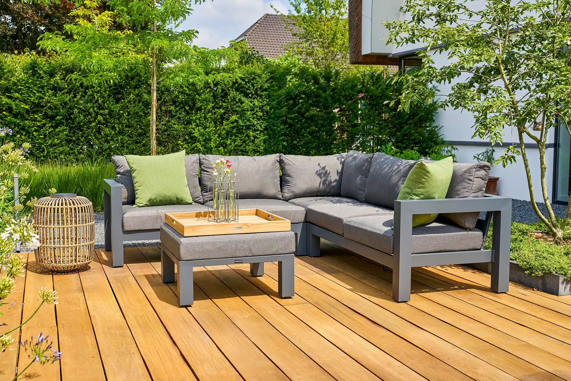 Outdoor living space with stylish furniture from Lifestyle Luca in natural surroundings.
