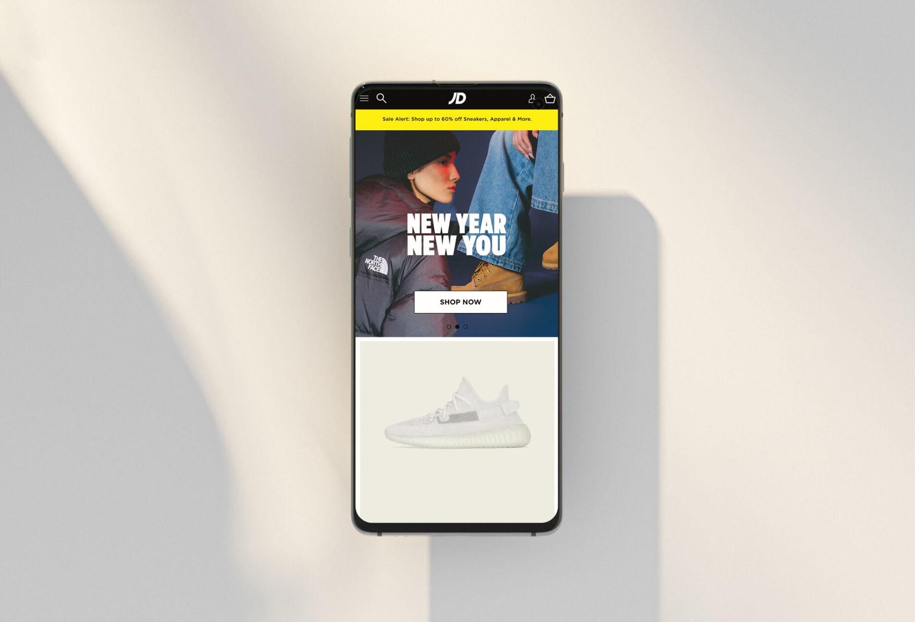 A mockup of an iPhone placed on a chair's back