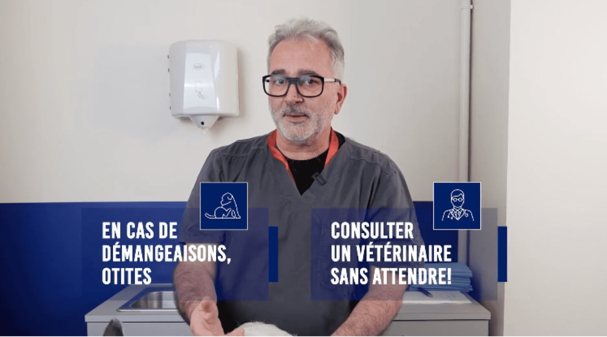 A person in business attire lies amidst scattered papers and folders on a red carpet, holding a phone receiver. The scene conveys chaos and stress.