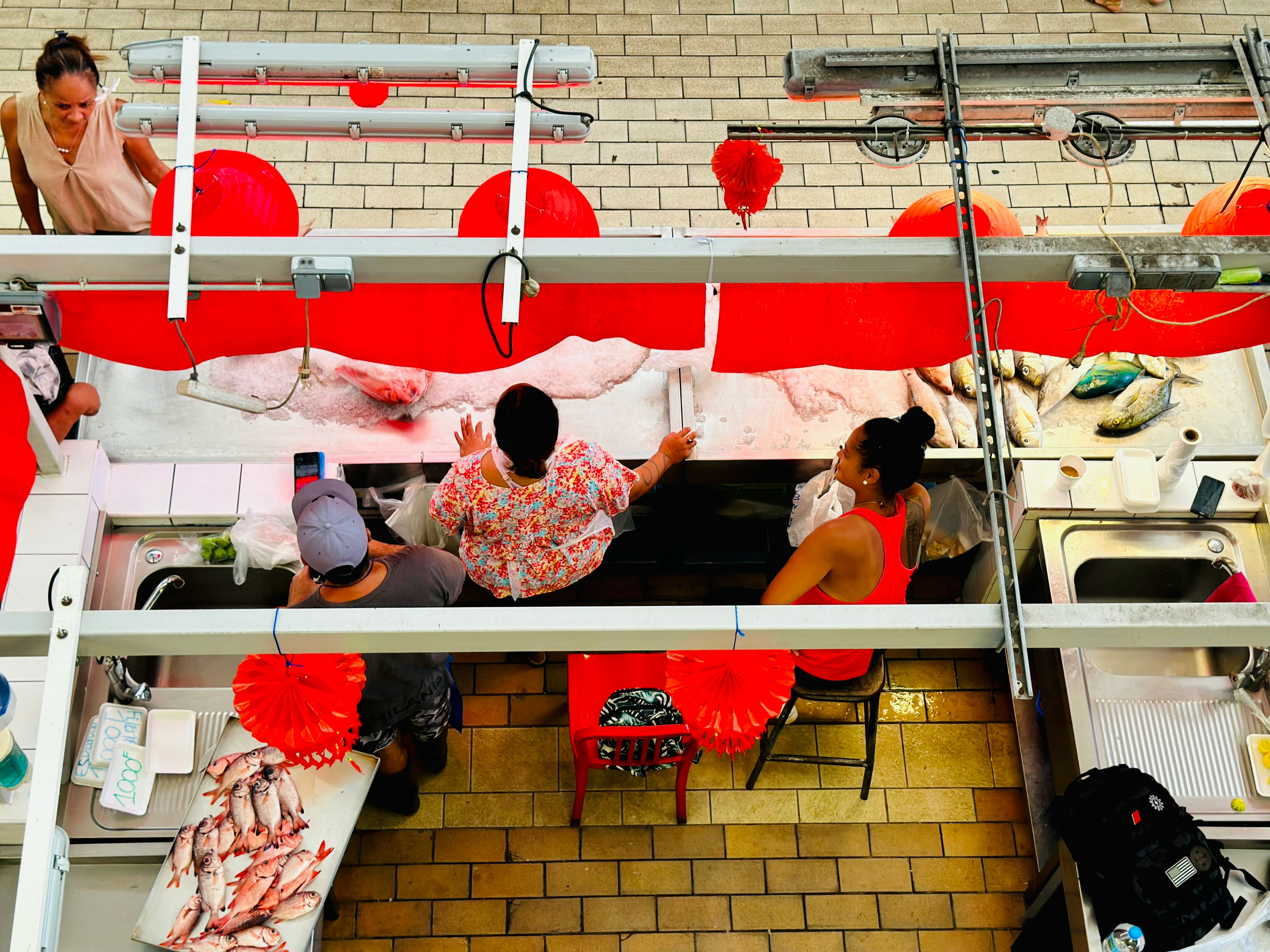 a group of people sitting at a table in a room