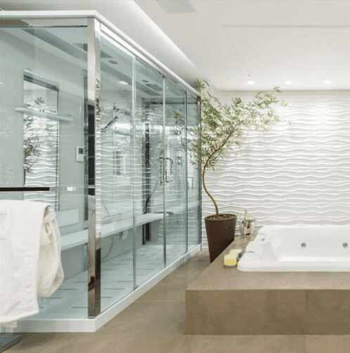 woman sitting around table holding tablet