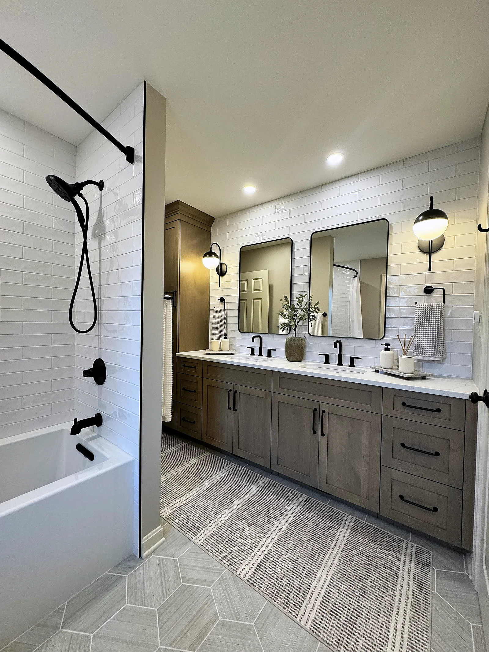 Moody custom bathroom renovation in Sewickley, PA by Haute Designs — Noir Oasis project