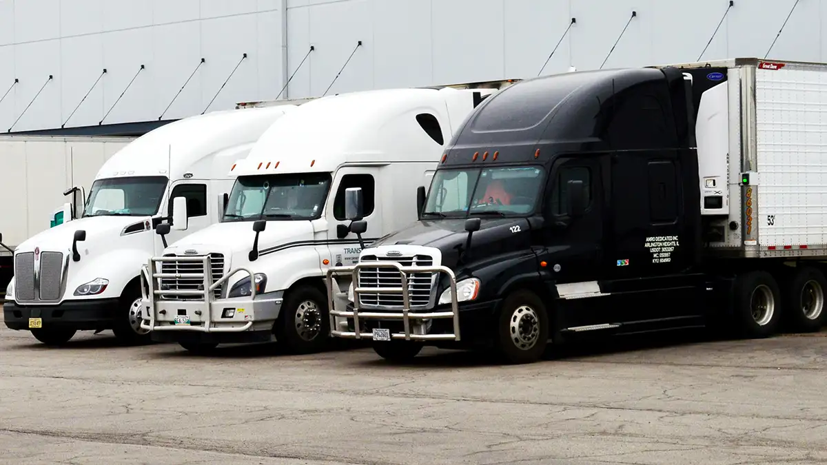 Semi Trucks in Industrial Parking Lot