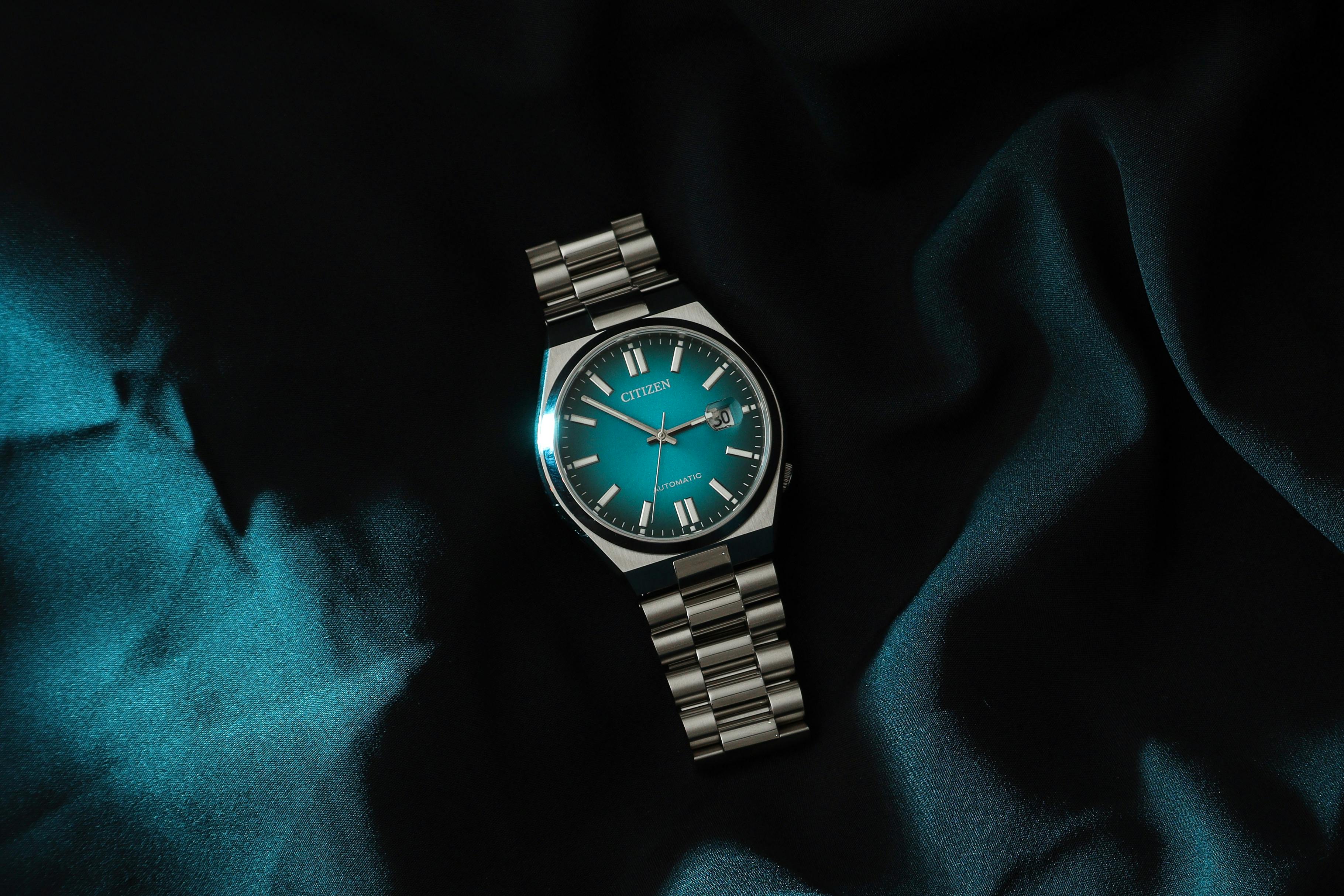 Citizen automatic watch with a blue fume dial and metal bracelet