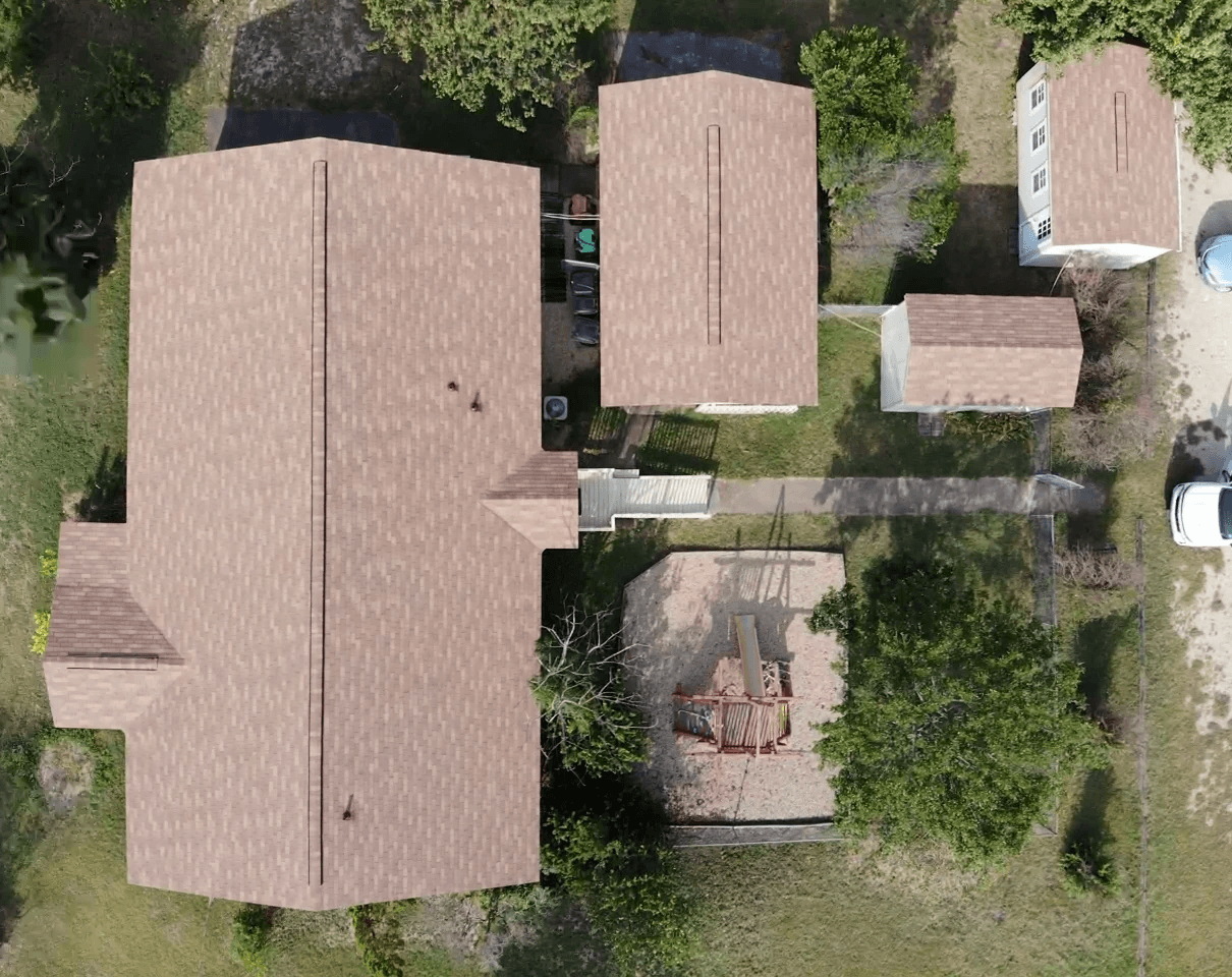 Small church in Round Rock with three-tab shingles and a ridge vent, offering a traditional and functional roofing design.