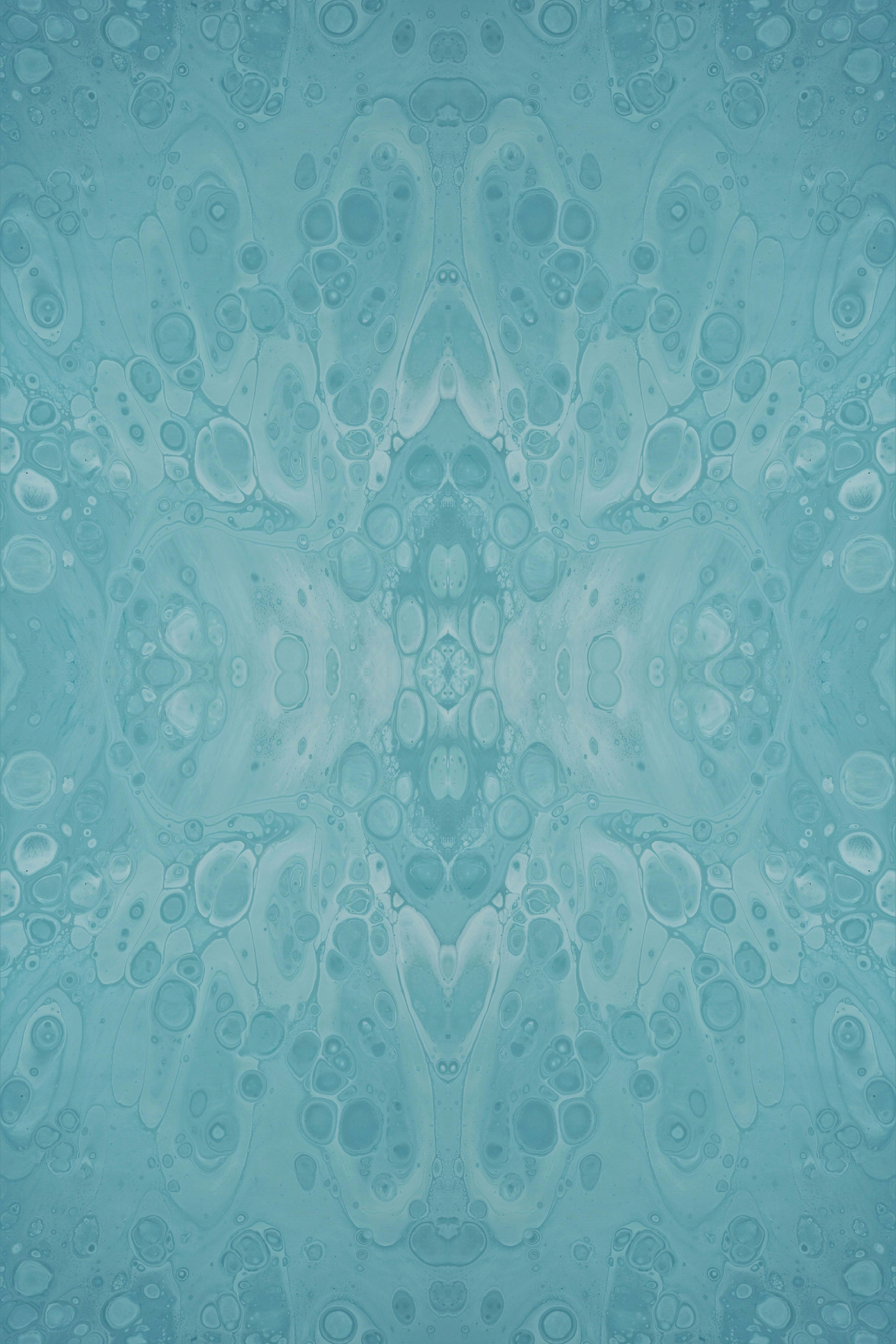 a blue background with a pattern of bubbles