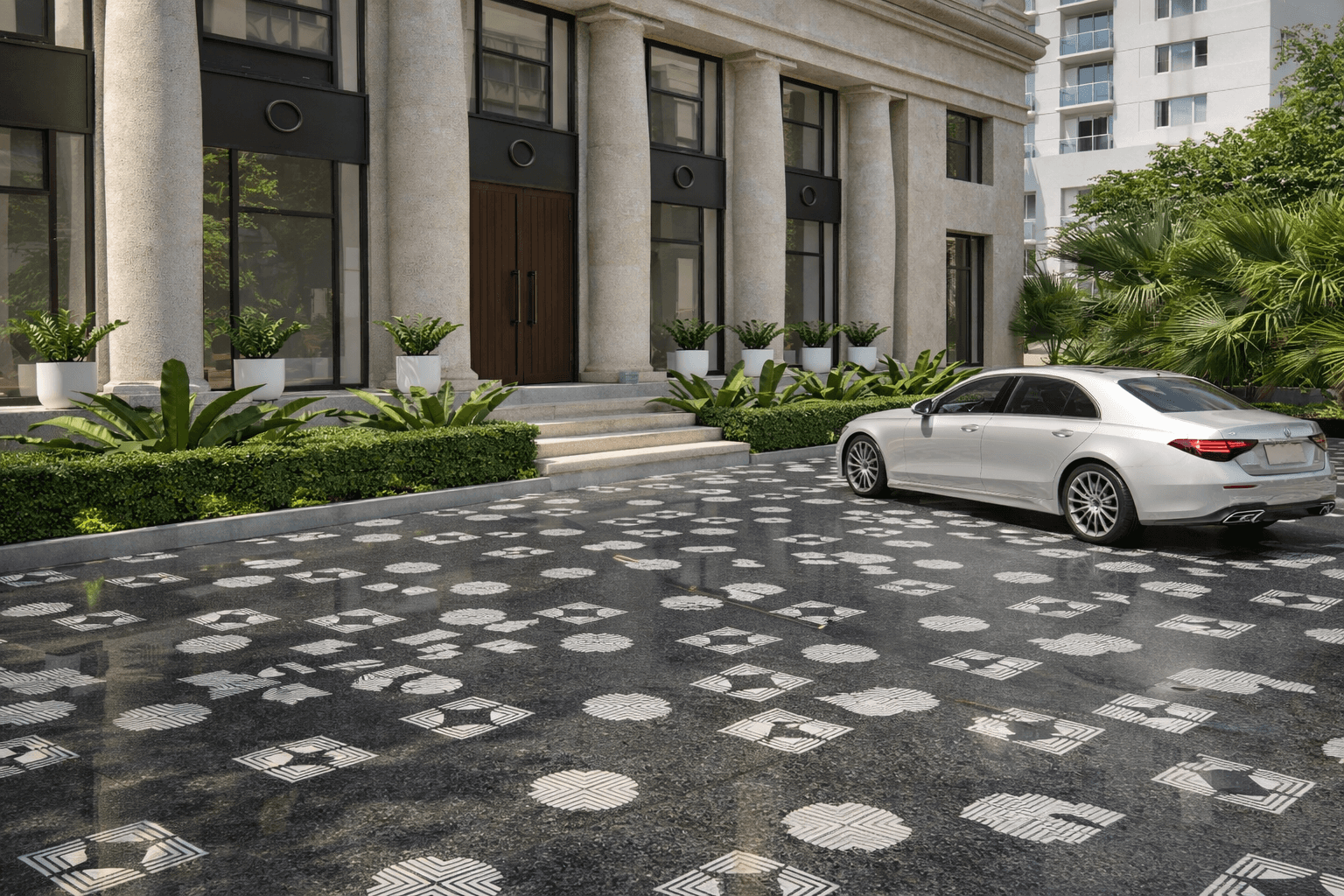 Zenith stone paving installed in modern residential driveway with bold geometric patterned flooring design
