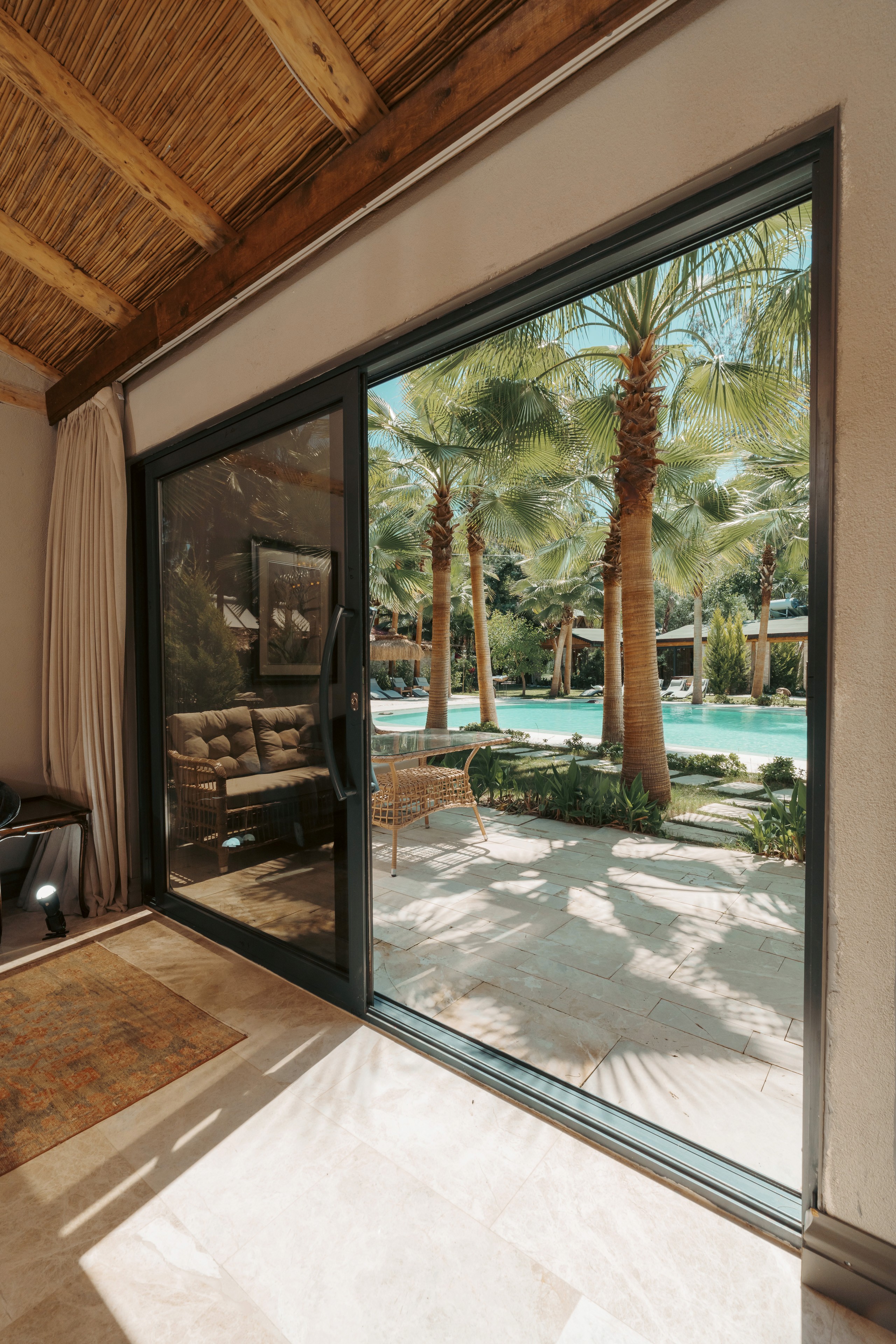 the private hot tub on the balcony, modern design with clean lines and natural materials.