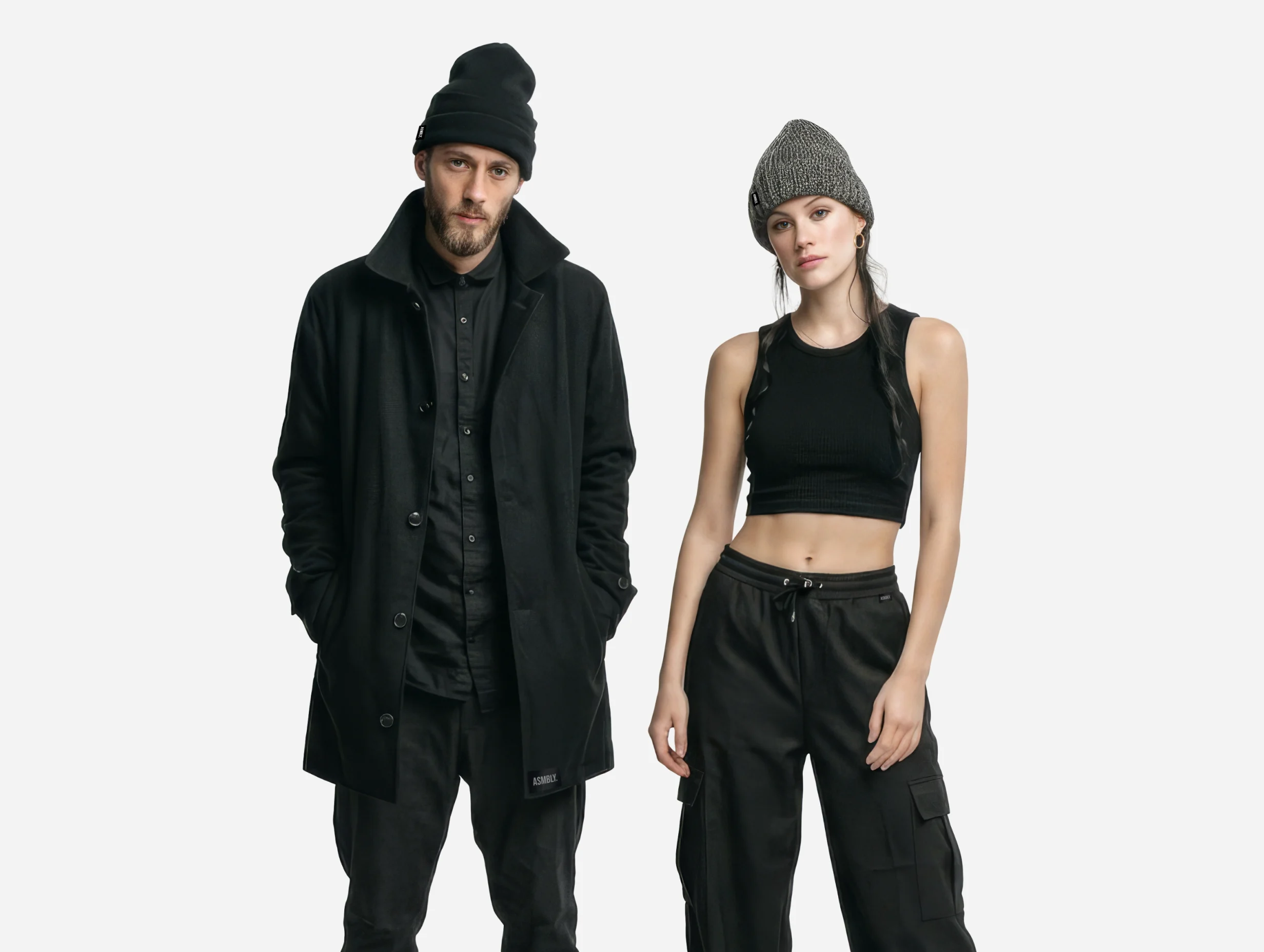 Studio portrait of two models wearing coordinated looks from Assembly fashion label.
