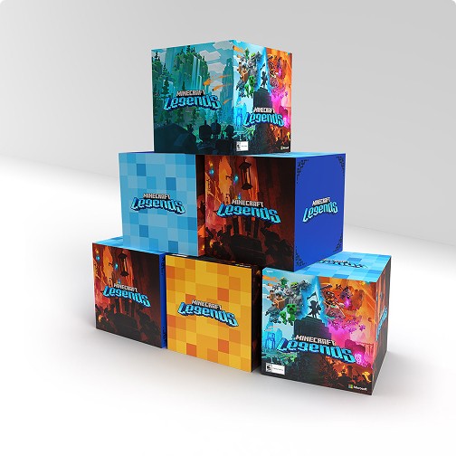 A stack of cube shaped Minecraft Legends packages featuring different art
