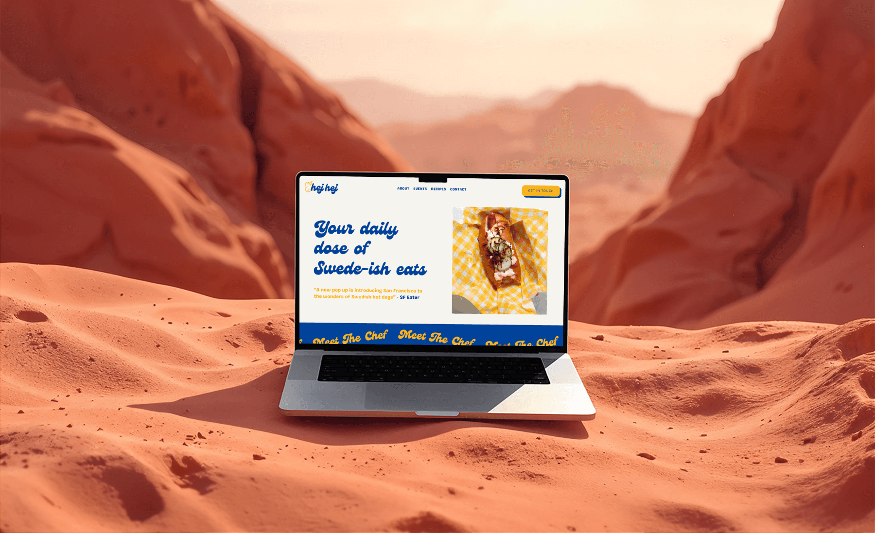 Laptop mockup sitting on red sand
