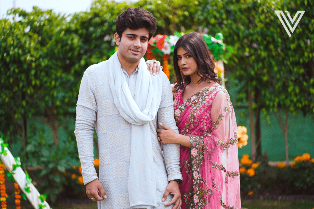 A North Indian couple wearing wedding attire