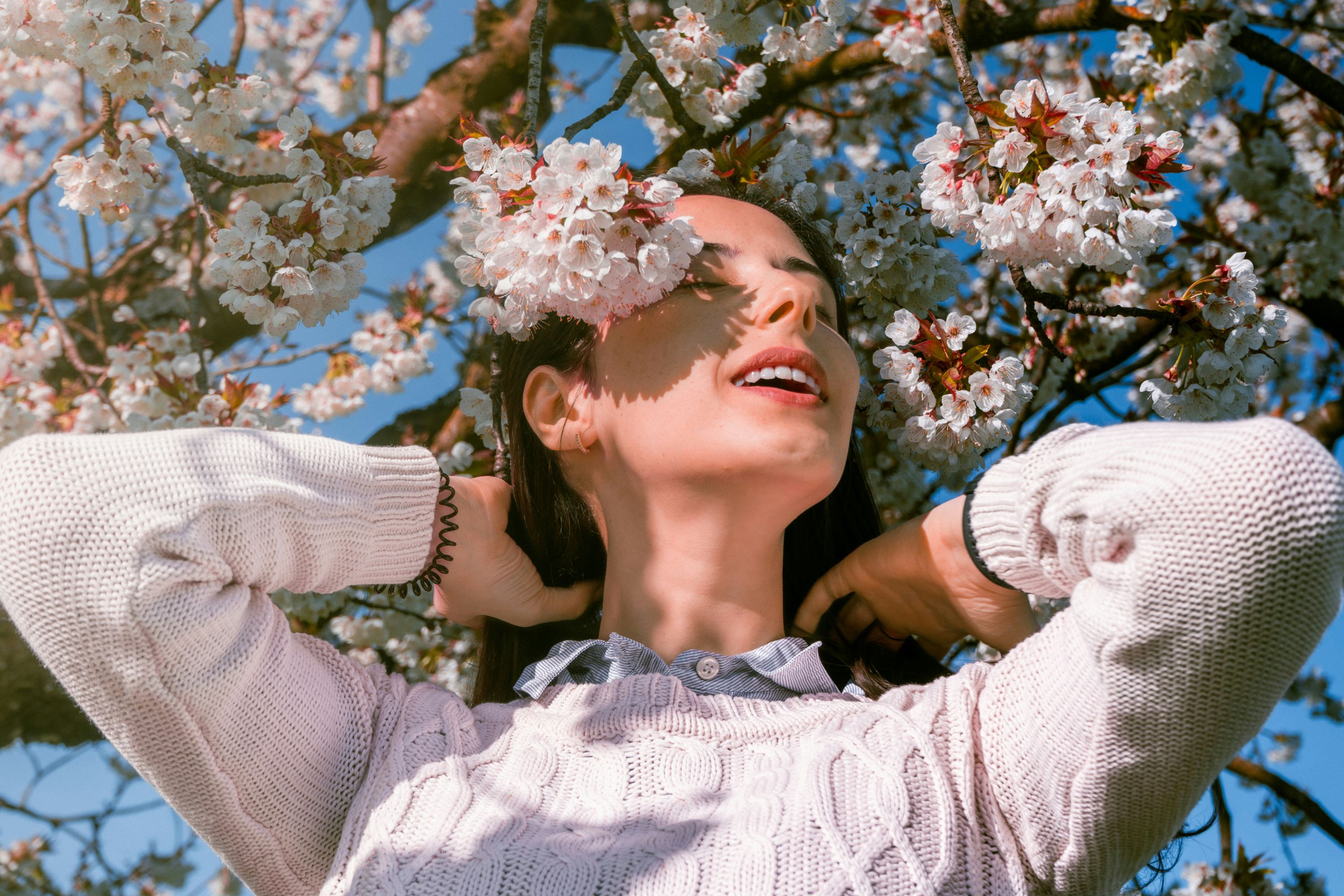 Woman in nature under a tree