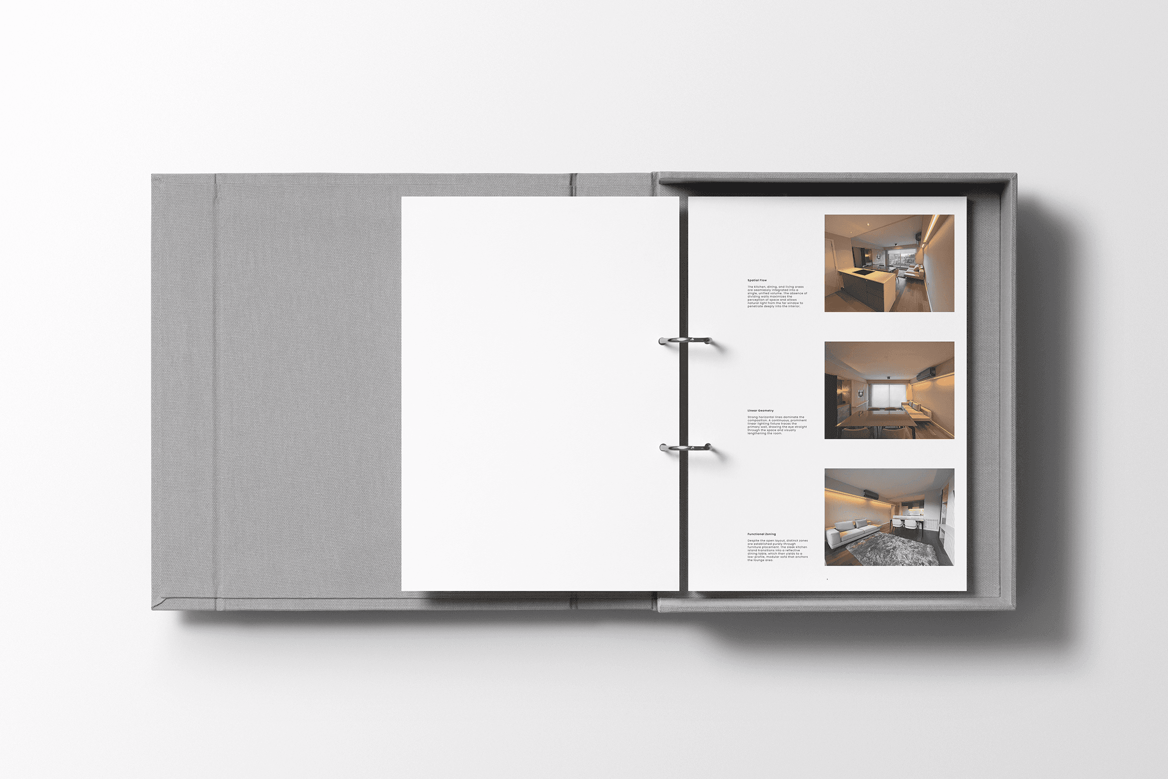 Professional physical brand book mockup showcasing interior design photography and clean typography layouts.