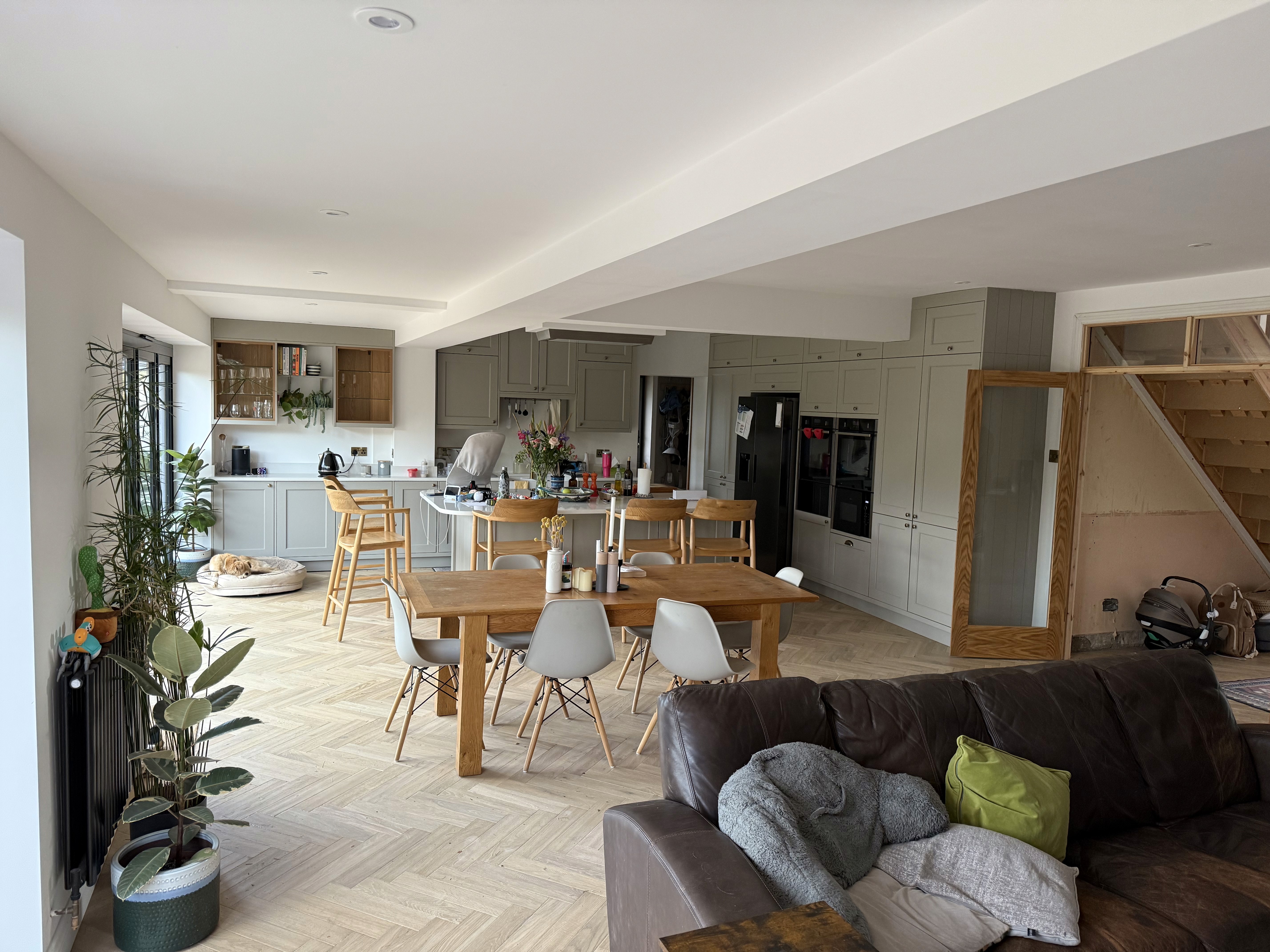 An architect working on a draft with a pencil and ruler