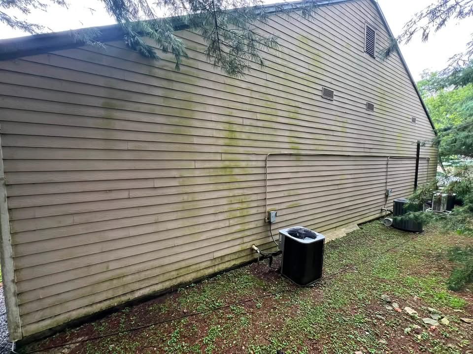 Before business exterior cleaning showing visible buildup and discoloration on exterior surfaces