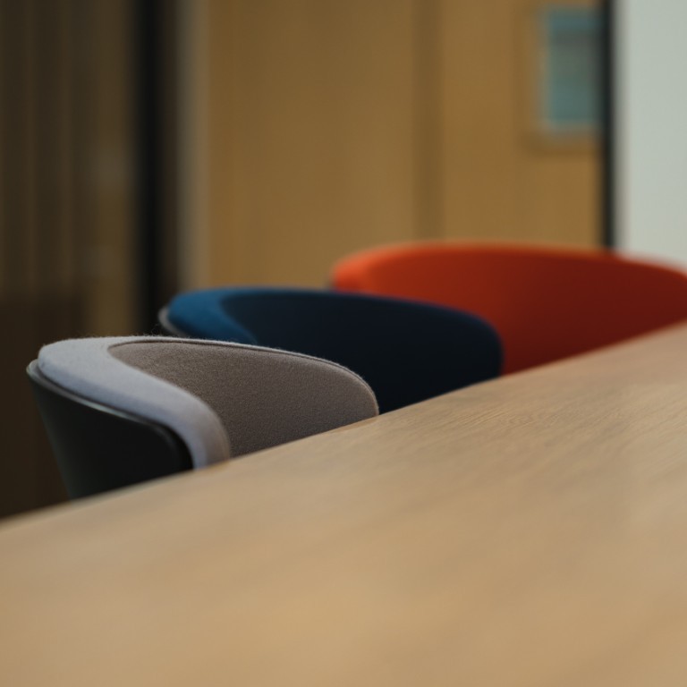 Three different colour meeting chairs