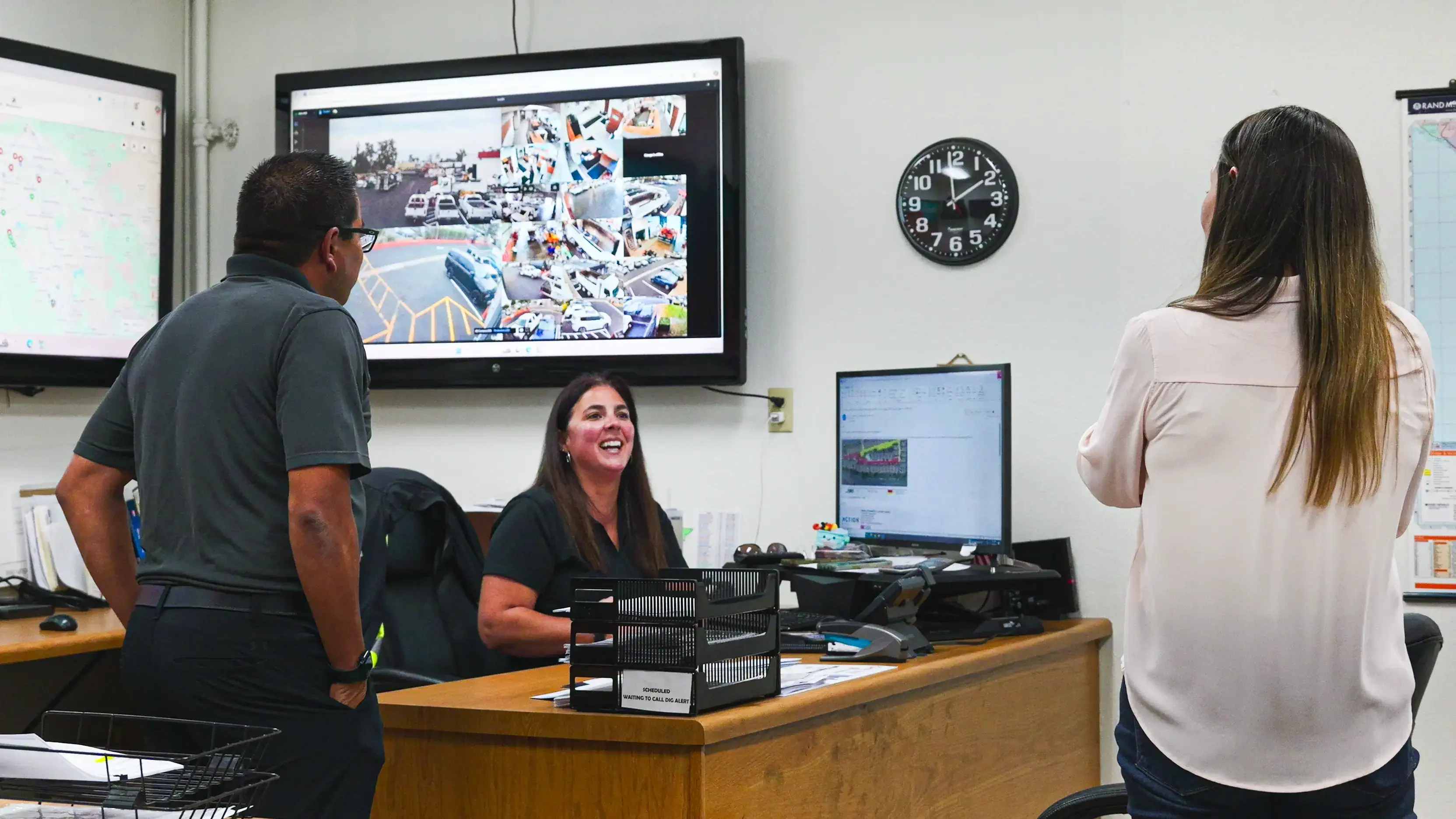 Happy diverse team talking in office